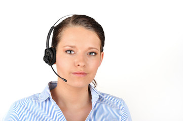 Black haired business woman with headset