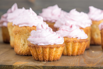 homemade cupcake with pink cream