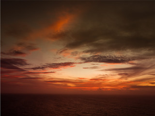 Sunset over the ocean - obrazy, fototapety, plakaty