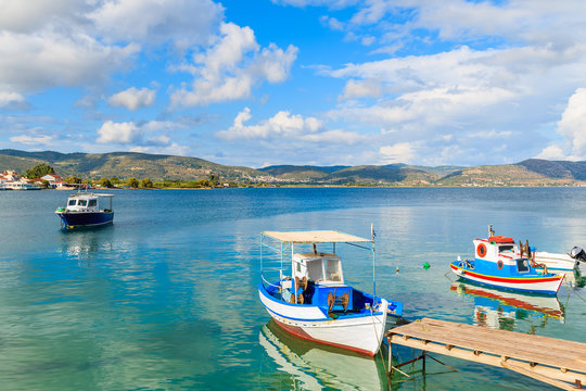 Typical Greek fishing boats mooring on coast of Samos island, Greece