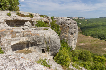 Crimea. Cave city Eski-Kermen on a hot summer day, fighting bastions