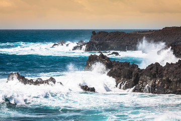 Powerful waves of Atlantic ocean near Tenerife coast, focus on w