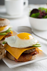 Breakfast burger with avocado, cheese and bacon
