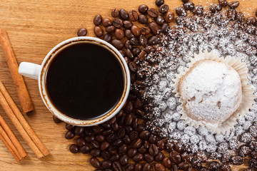 Sweet muffin and coffee. Overhead view