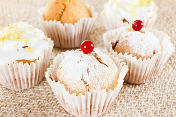 Muffins with cranberries and lemon zest, closeup