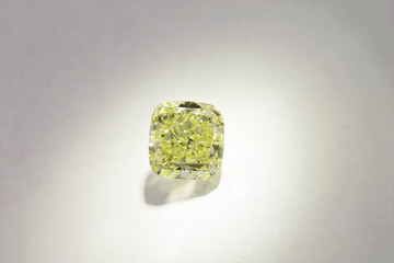 Stunning Canary Yellow Cushion Cut Diamond in the Spotlight