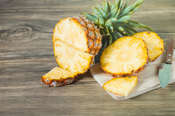 pineapple on the wood texture background