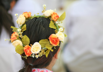 Blurred of Female hair with Flower crown.