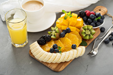 Fruit plate with berries, mango and kiwi