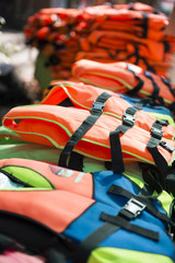 pile of many life jackets