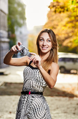 young smile woman sunlight city portrait