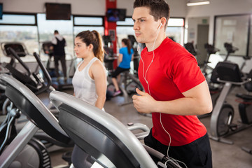 Man doing cardio and listening to music