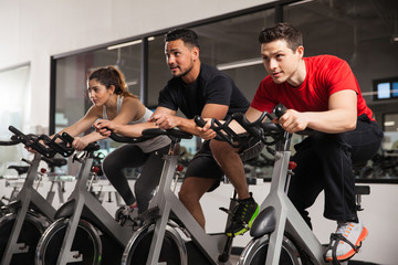 People doing some spinning at a gym