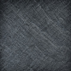 Dark grey black slate background or texture.
