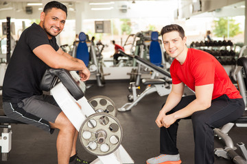 Men lifting some weights at the gym