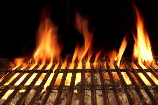 Barbecue Fire Grill Isolated On The Black Background, Close-up