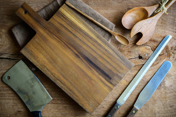 wooden utensil in kitchen on old wooden background with copy space