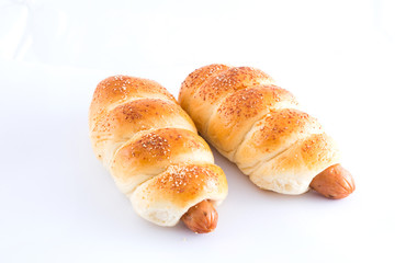 sausage dough on white background