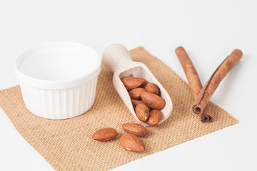Fototapeta na wymiar almonds in wood spoon
