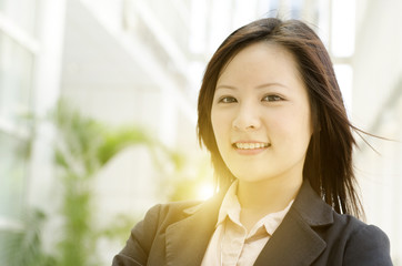 Young Asian business woman smiling