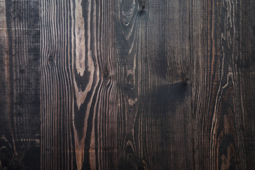 Fototapeta premium Dark brown wooden plank background