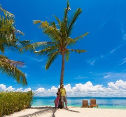 Philippines,  woman and man beach palm