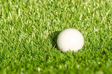 Golf ball on astro turf