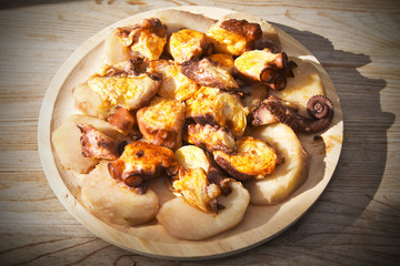 cap octopus with peppers and potatoes