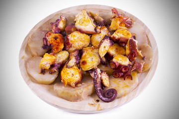 cap octopus with peppers and potatoes isolated