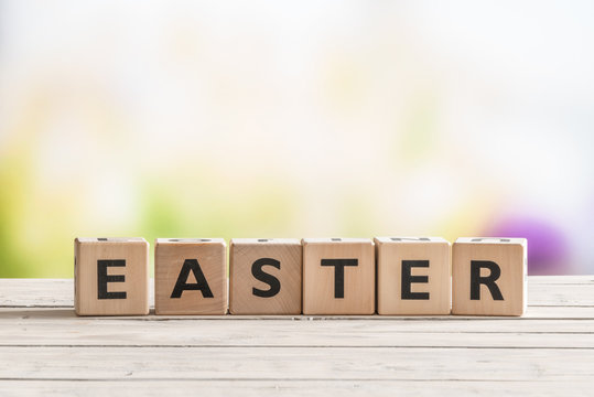 Easter sign on a wooden table