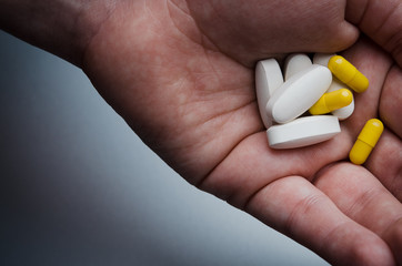 holding medical tablets