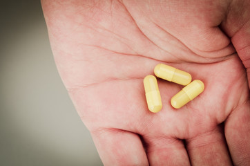 three yellow pills