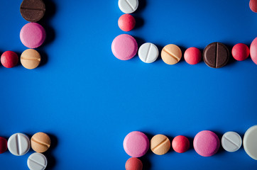 colored pills and tablets