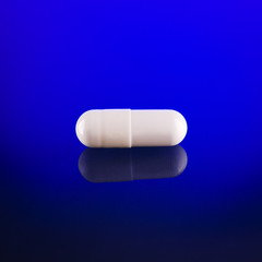 one white capsule