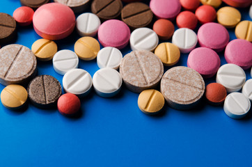 Fototapeta na wymiar colored pills and tablets