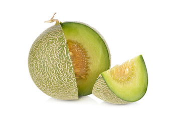 portion cut ripe honeydew melon on white background