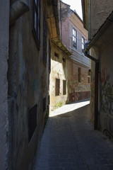 Fototapeta na wymiar Narrow street in Brasov city.