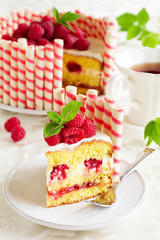 Waffle cake with raspberries and cream.