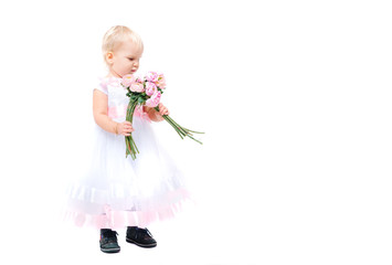 Beautiful little girl with flowers