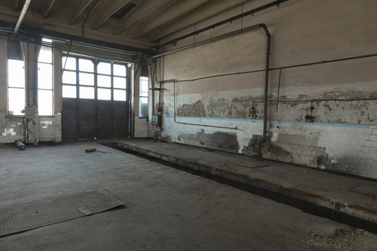 Abandoned room. Renovation needed. Grungy factory