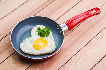 fried egg form of heart