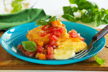 Fried brie with tomato salsa.