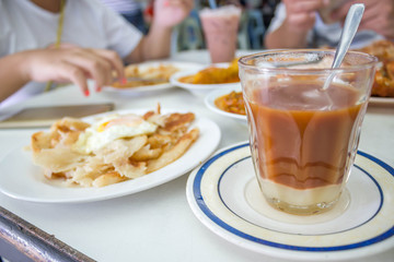 glass of hot milk tea