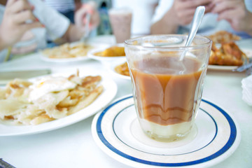 glass of hot milk tea