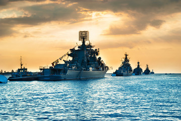 Military navy ships in a sea bay