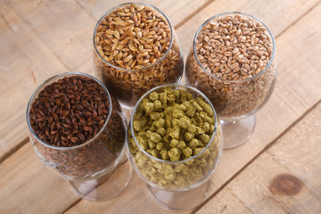Malt and hops in glasses