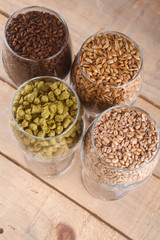 Malt and hops in glasses