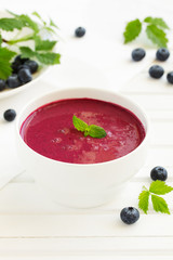 Desert- blueberry soup with cream.