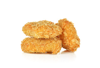 deep fried haddock fish in batter on white background