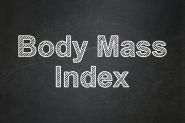 Health concept: Body Mass Index on chalkboard background